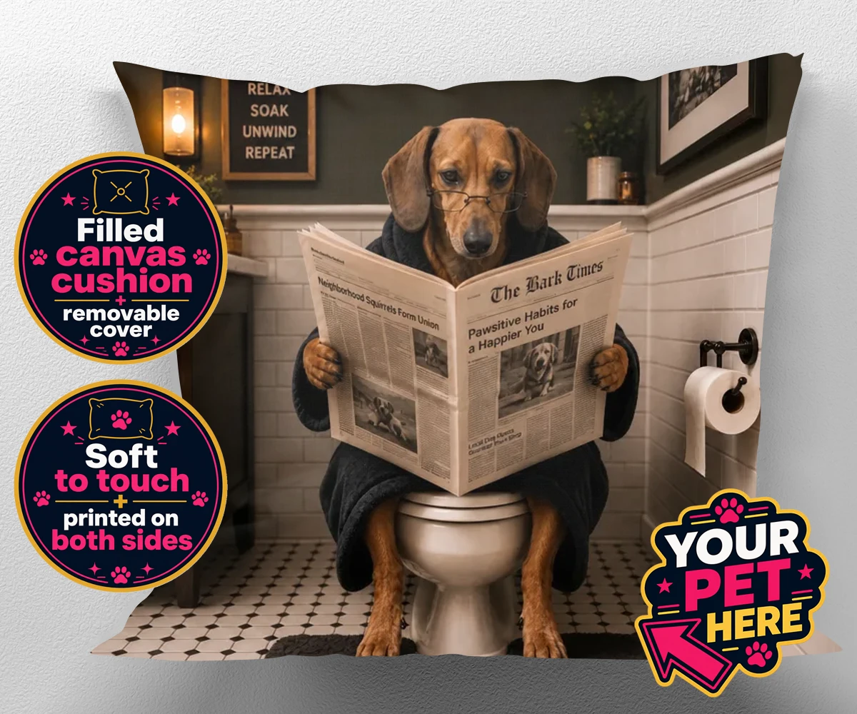Personalised Bathroom News dog canvas cushion with a dog in a bathrobe and glasses, sitting on a loo.